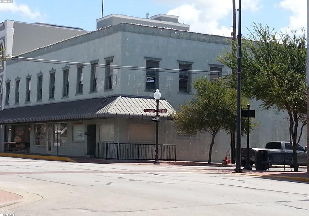 A pre-war brick structure mid-retrofit with new steel bracing.